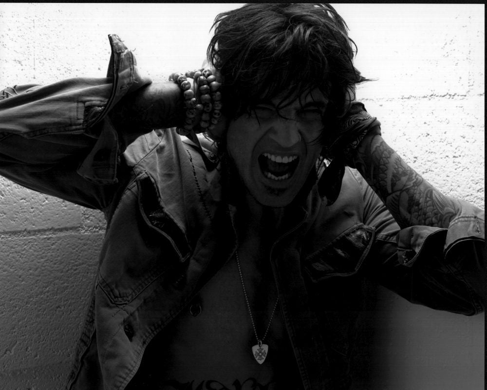 Tommy Lee Covering Ears Screaming Black and White Photo Print