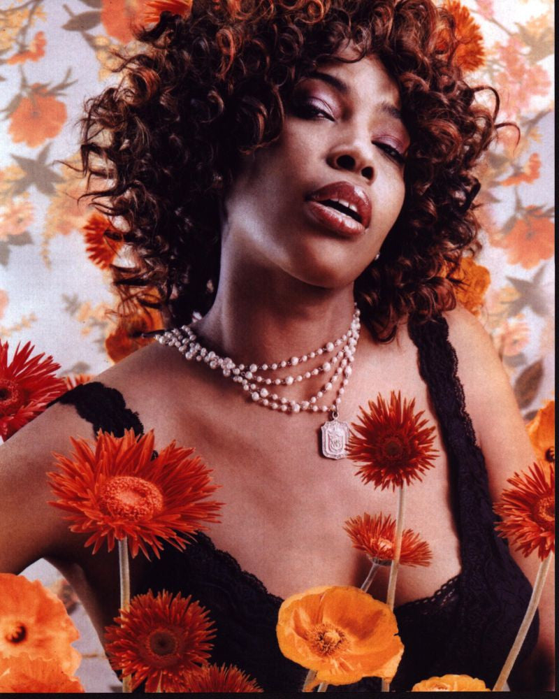 Macy Gray with Vibrant Orange and Yellow Flowers Photo Print