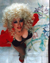 Dolly Parton Looking Up Photo Print in Black Top and Red Jacket