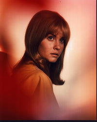 Olivia Newton-John headshot photo print looking over shoulder.