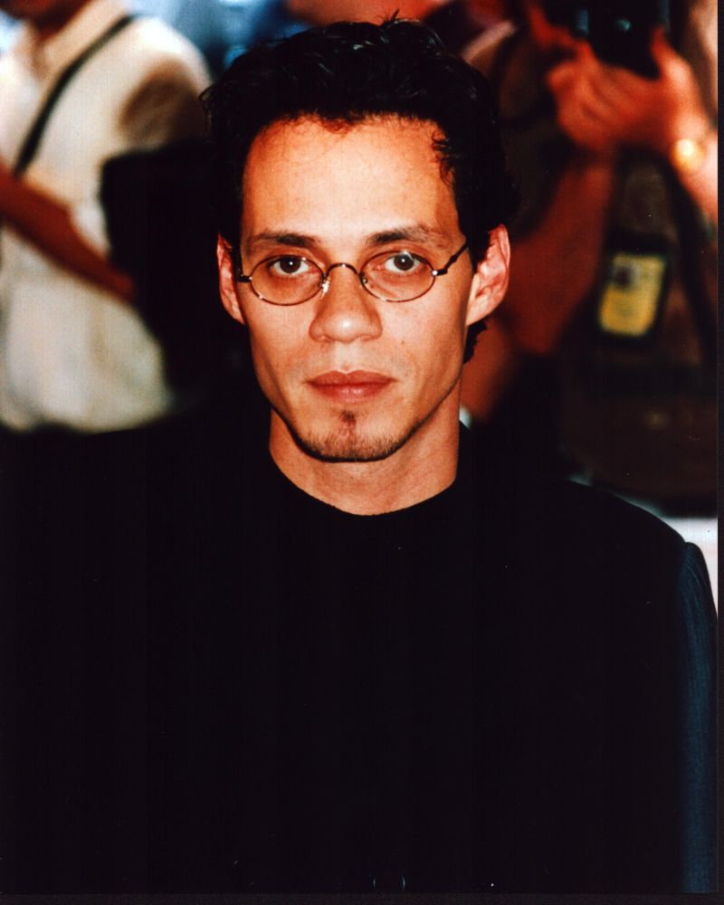 Stylish Marc Anthony photo print in black top and glasses
