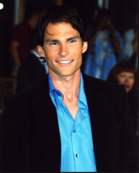 Seann William Scott photo print in black blazer and unbuttoned blue shirt.