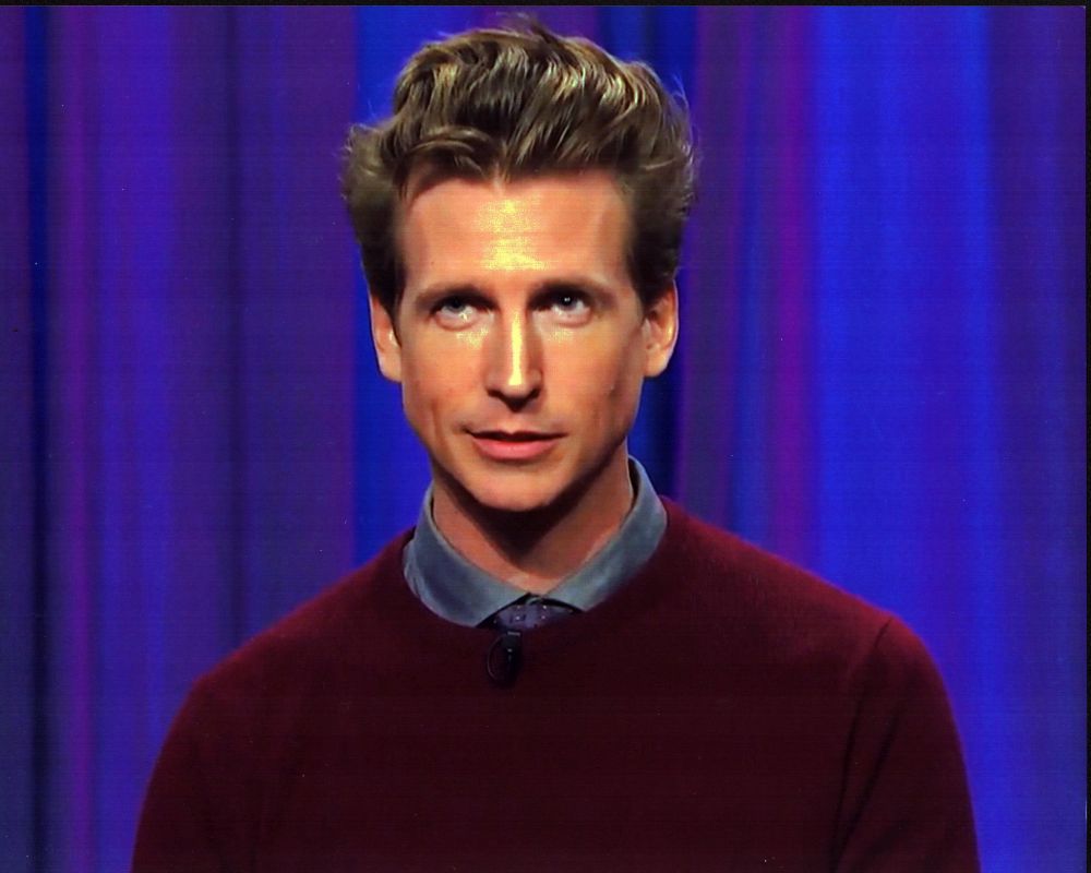 Josh Meyers in Red Sweater Photo Print - vibrant and colorful decor piece.