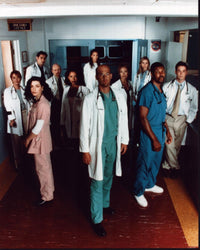 E.R. Cast in Hall Photo Print showcasing the iconic television series.
