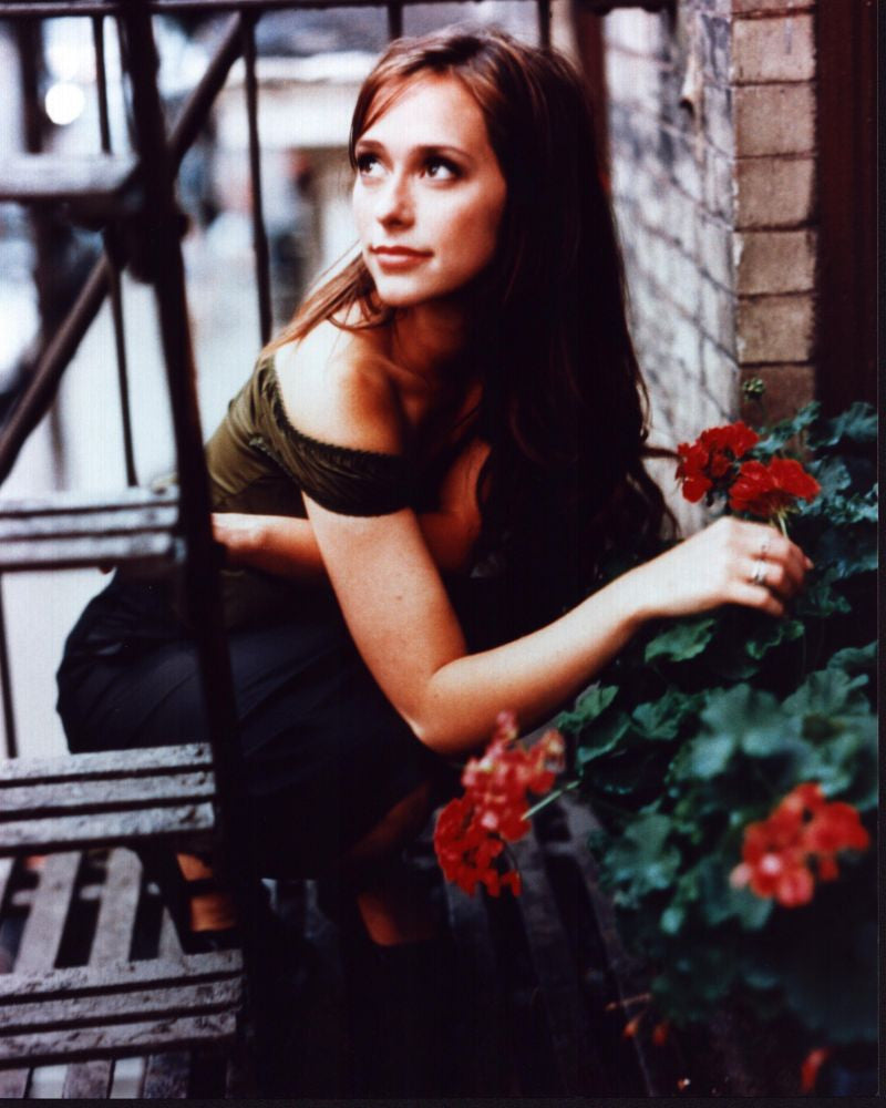 Jennifer Love Hewitt On Fire Escape with Flowers Photo Print