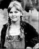 Kirsten Dunst in Jumanji black and white photo print with pigtails and overalls.