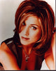 Jennifer Aniston close-up photo print in gray vest with hand in hair.