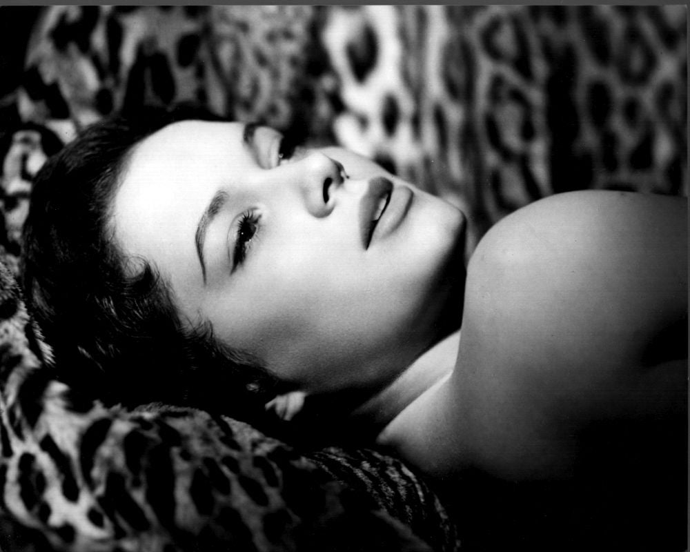 Luciana Paluzzi Laying on Animal Fur Black and White Photo Print