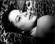 Luciana Paluzzi Laying on Animal Fur Black and White Photo Print