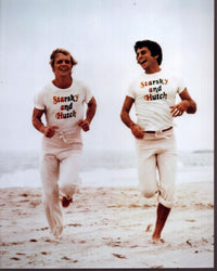 David Soul and Paul Michael Glaser running on beach photo print from Starsky and Hutch.