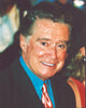 Regis Philbin iconic photo print in aqua shirt with pink tie