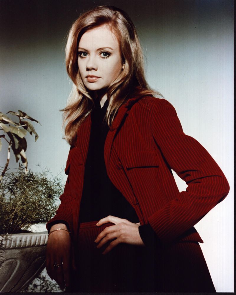 Hayley Mills photo print in red suit with hand on hip, classic Hollywood style.