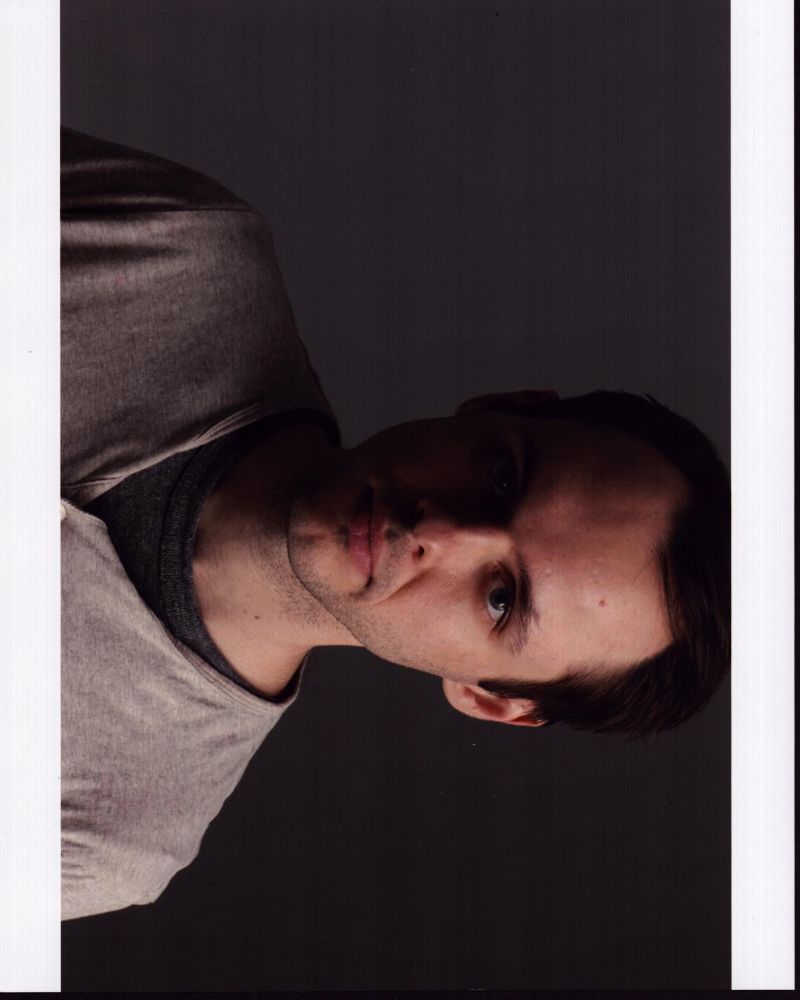 Christopher Denham headshot photo print showcasing his charismatic presence.