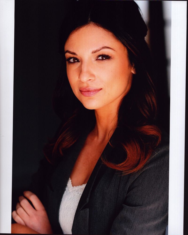 Floriana Lima headshot in gray suit photo print