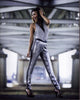 Jeannie Mai Jenkins photo print in silver outfit showing style and elegance.