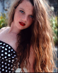 Stefania Lavie Owen in a polka dot strapless top photo print.