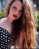 Stefania Lavie Owen in a polka dot strapless top photo print.
