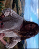 Stefania Lavie Owen in field photo print with hands on hips.