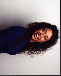 Liza Koshy in blue long sleeve top photo print