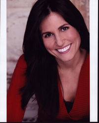 Bridget McManus headshot in red sweater photo print