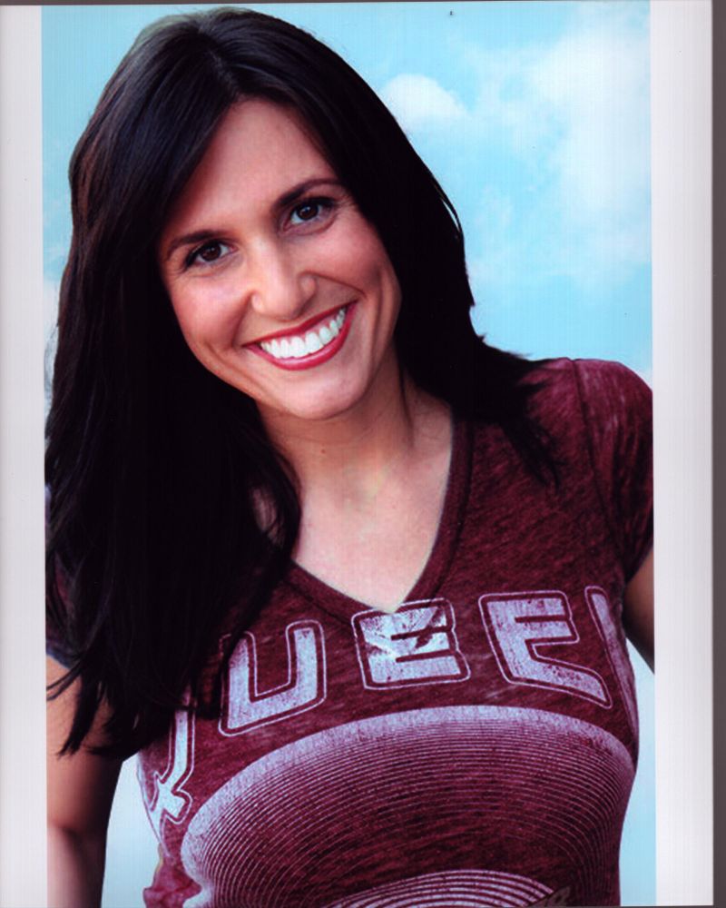 Bridget McManus headshot photo print featuring a red shirt.