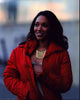 Candice Patton photo print in red coat and gold necklace