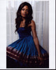 Naomie Harris photo print in blue strapless dress.