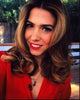 Orly Shani In Red Top Photo Print showcasing a bold fashion statement.