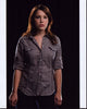 Marla Sokoloff photo print in tan button down shirt.
