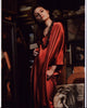 Phillipa Soo photo print in orange silk dress, vibrant and elegant.