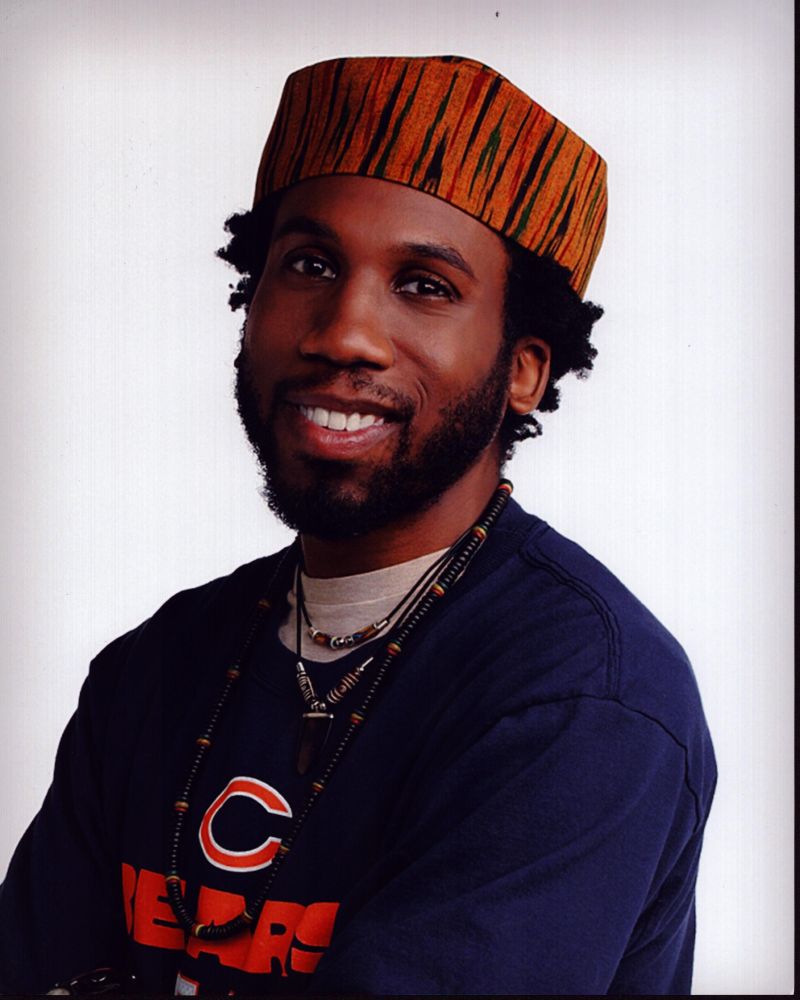 Nyambi Nyambi headshot photo print in stylish hat