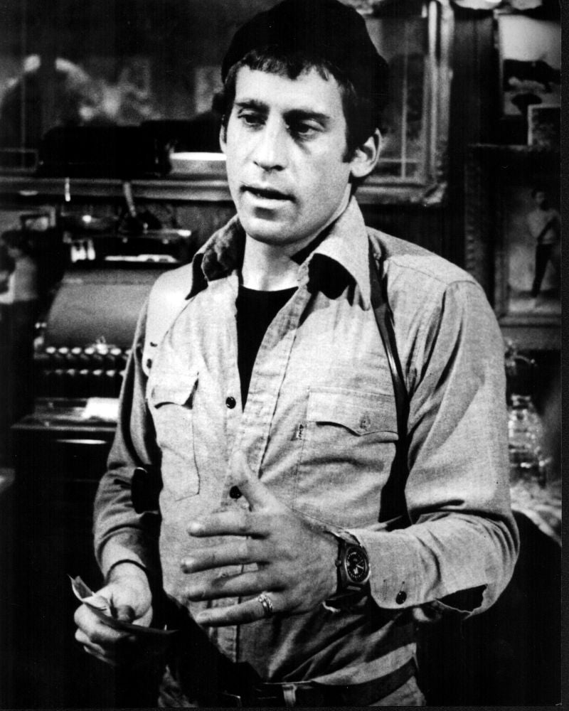 Paul Michael Glaser as Starsky in black and white photo print, wearing a gun holster.