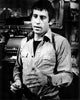 Paul Michael Glaser as Starsky in black and white photo print, wearing a gun holster.