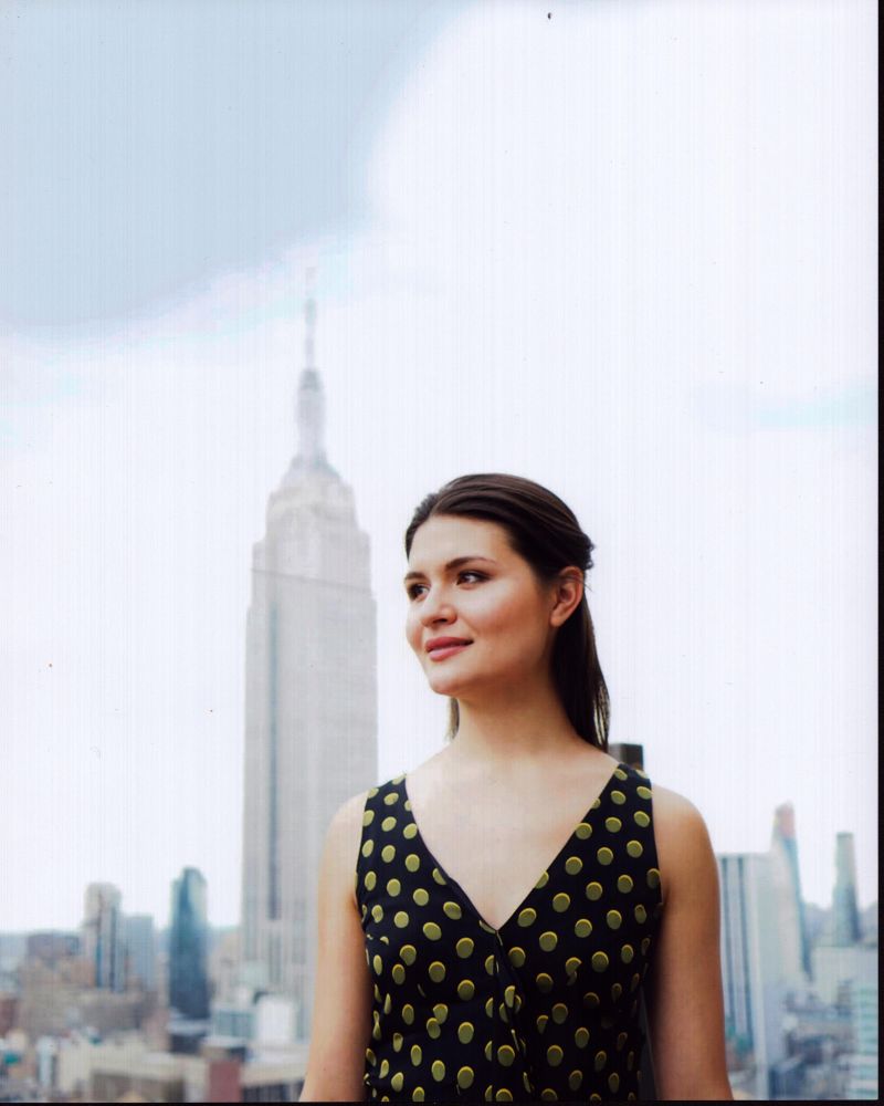 Phillipa Soo rooftop photo print showcasing urban elegance.
