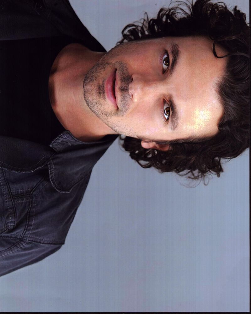 Daniel Hall headshot photo print in gray jacket, available in multiple sizes.