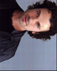 Daniel Hall headshot photo print in gray jacket, available in multiple sizes.