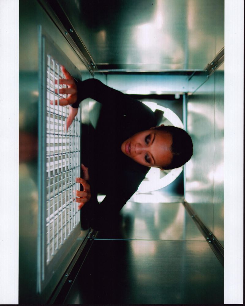 Zoe Saldana in Air Duct scene from Colombiana - Photo Print