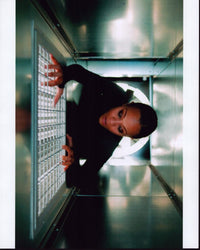 Zoe Saldana in Air Duct scene from Colombiana - Photo Print