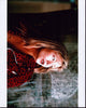 Theresa Russell in a red animal print jacket photo print