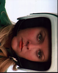 Simone Griffeth wearing helmet in Death Race 2000 photo print.