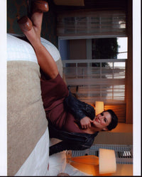Gina Carano Sitting On Bed Photo Print in multiple sizes.