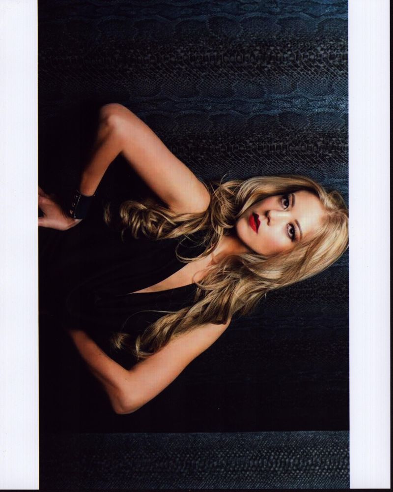 Fernanda Castillo in black low cut top photo print