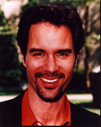 Eric McCormack photo print in black jacket and orange shirt