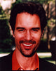 Eric McCormack photo print in black jacket and orange shirt