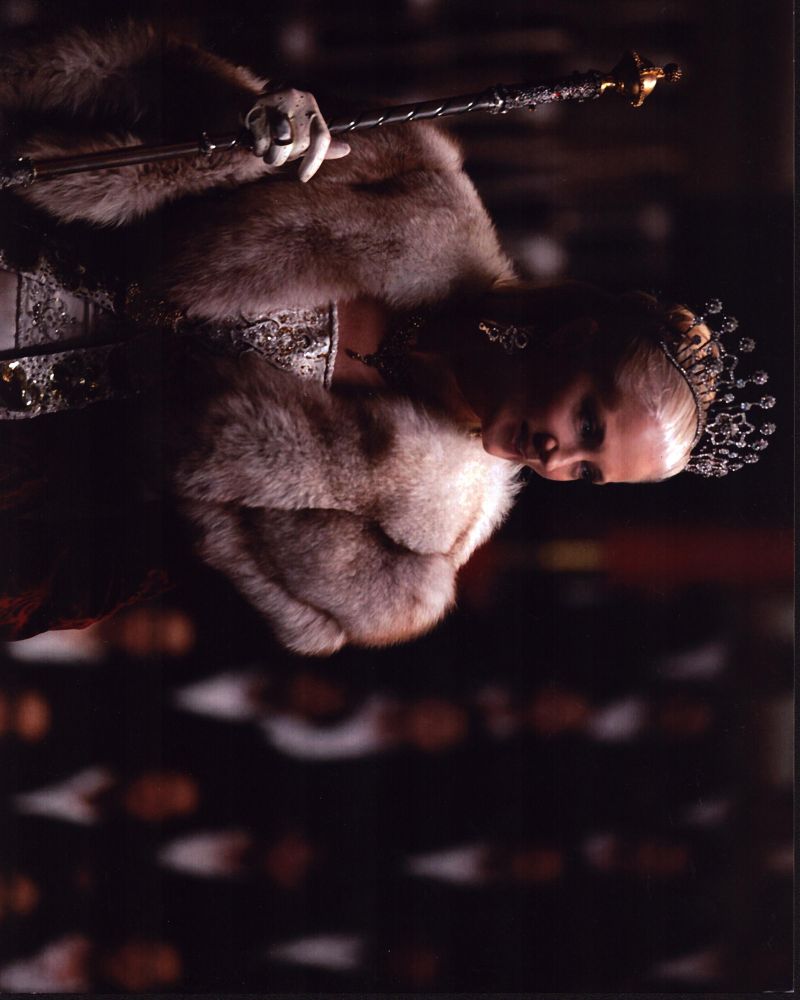 Joely Richardson in Vampire Academy Photo Print wearing a robe with a crown and scepter.