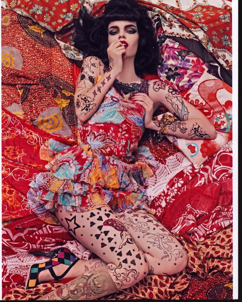 Meghan Collison photo print featuring colorful dress and tattoos.