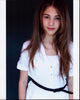 Madison McAleer in stylish white top with belt photo print
