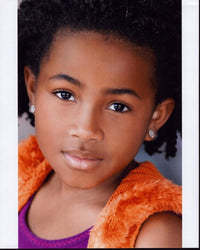 Layla Crawford headshot photo print in orange vest.