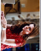 Kerris Dorsey sitting at a table in Ray Donovan photo print.