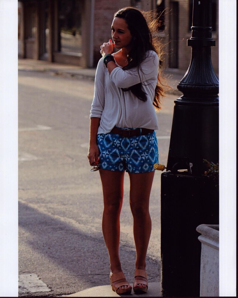 Madison Wolfe On Sidewalk Photo Print in Blue and White Shorts